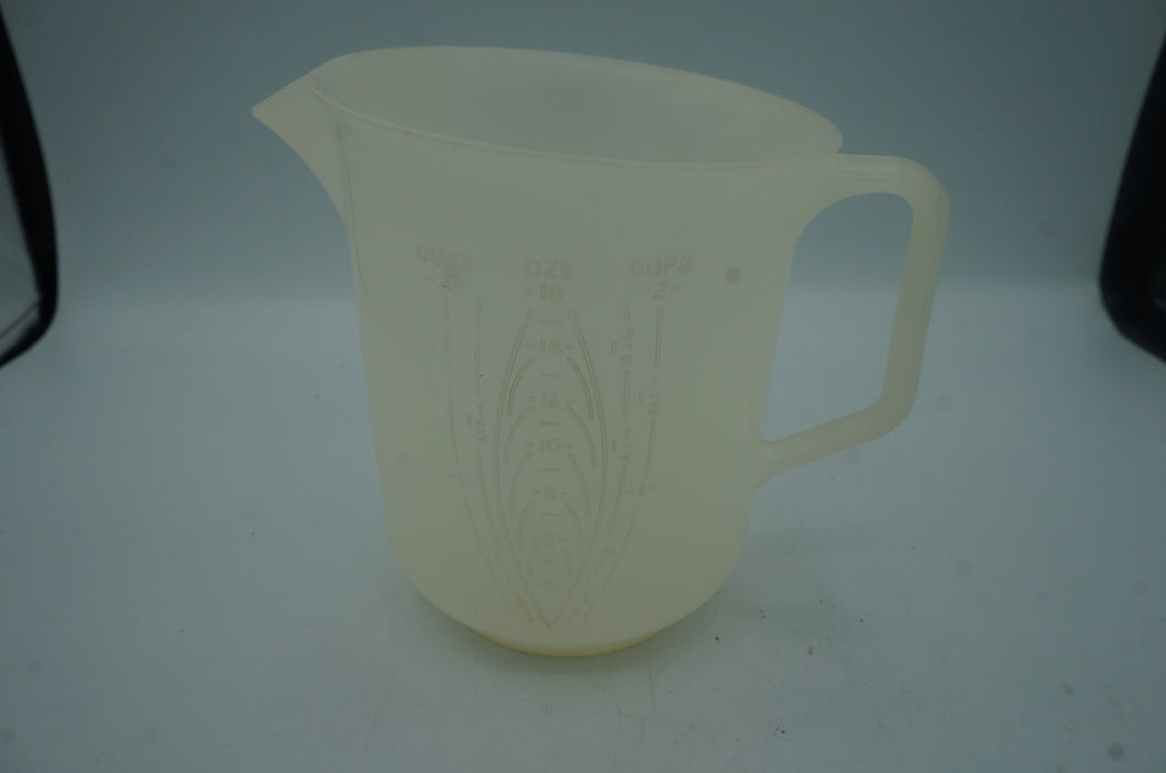 vintage Tupperware measuring cup- ohiohippies.com