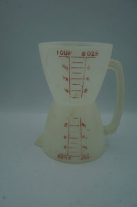 vintage Tupperware double-sided measuring cup- ohiohippies.com