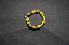 Load image into Gallery viewer, Golden, Green Glass Bead Bracelet - Caliculturesmokeshop.com
