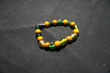 Load image into Gallery viewer, Golden, Green Glass Bead Bracelet - Caliculturesmokeshop.com
